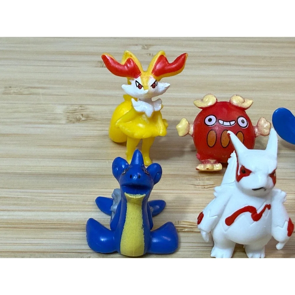 Pokemon Mini Figure Lot 9pc Jolteon Poliwag Corsola Lapras Braixen Zangoose